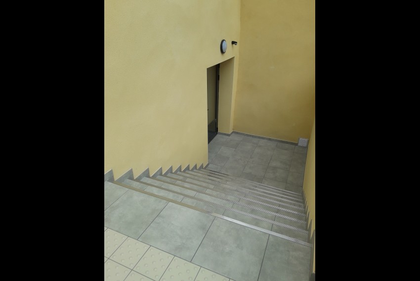 Tourouvre au Perche (61) : cr&eacute;ation d'un escalier enterr&eacute; pour acc&eacute;der &agrave; la salle Brassens.