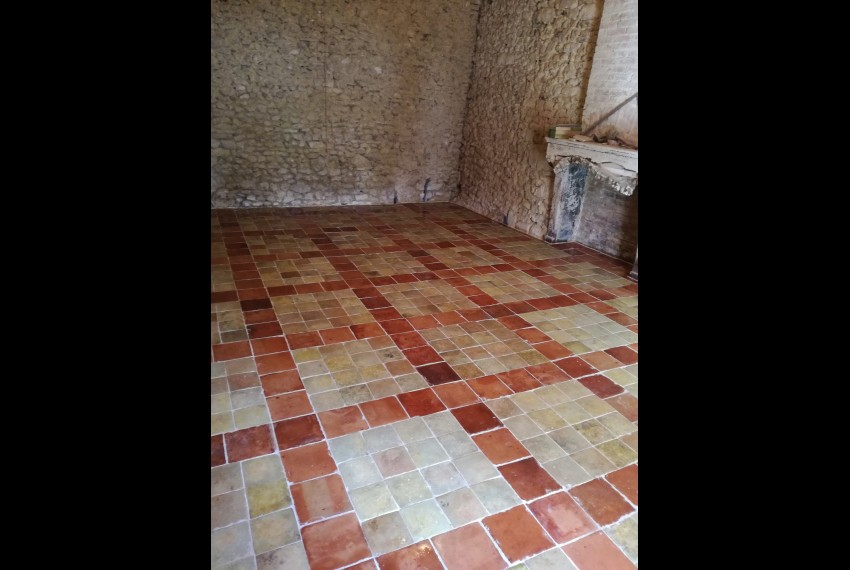 Le calepinage, imagin&eacute; par le client pour des tomettes de r&eacute;-emploi, est du plus bel effet !